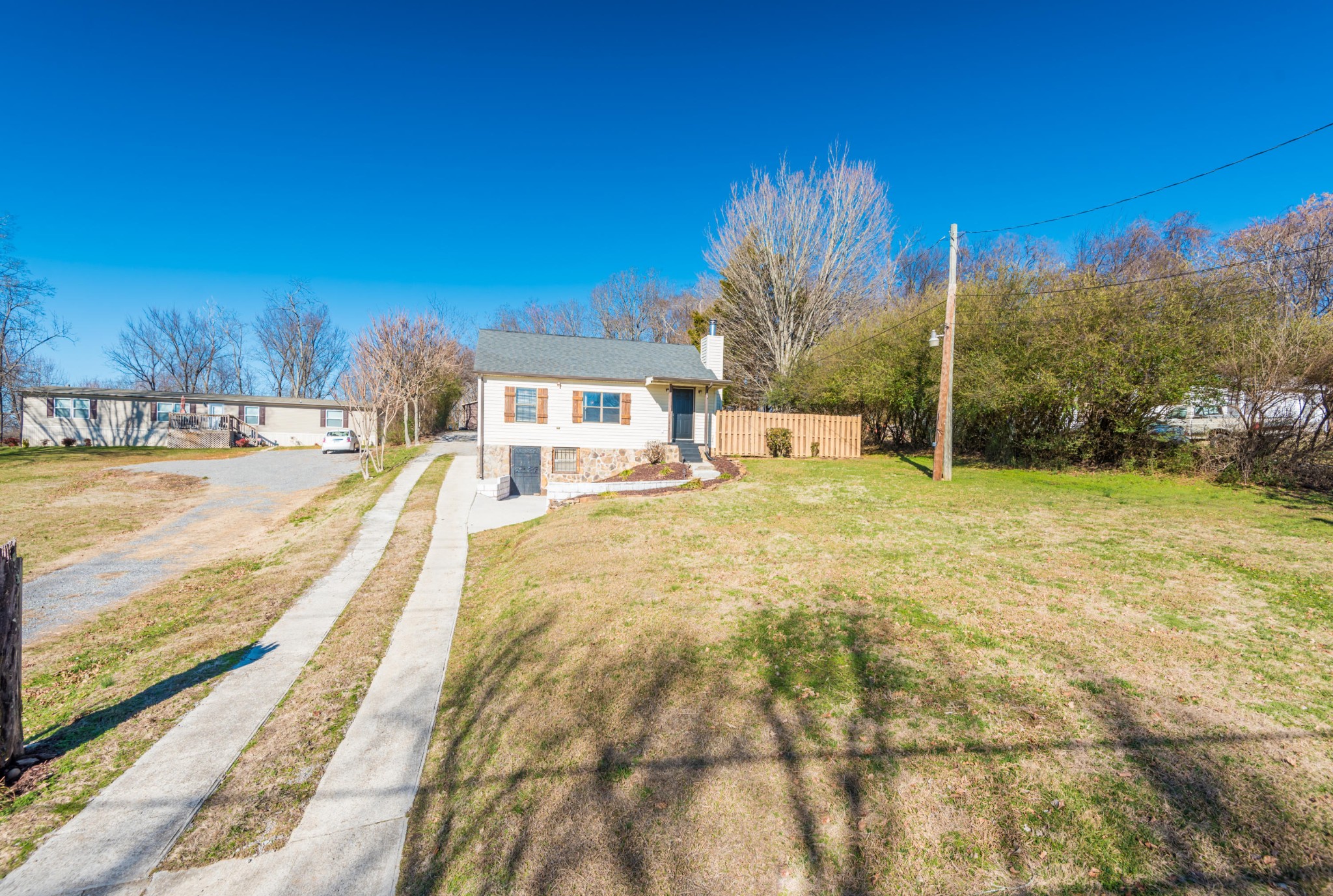 6313 Ridgeview Road Knoxville, TN 37918 - Photo 2 of 33 a swimming pool with outdoor seating and yard