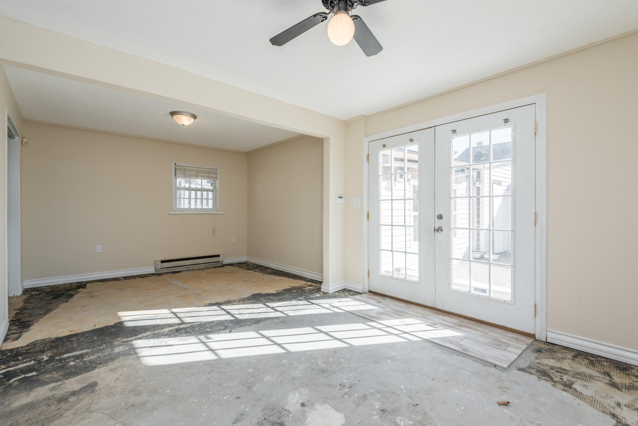 6313 Ridgeview Road Knoxville, TN 37918 - Photo 25 of 33 a view of a livingroom with a window and a ceiling fan