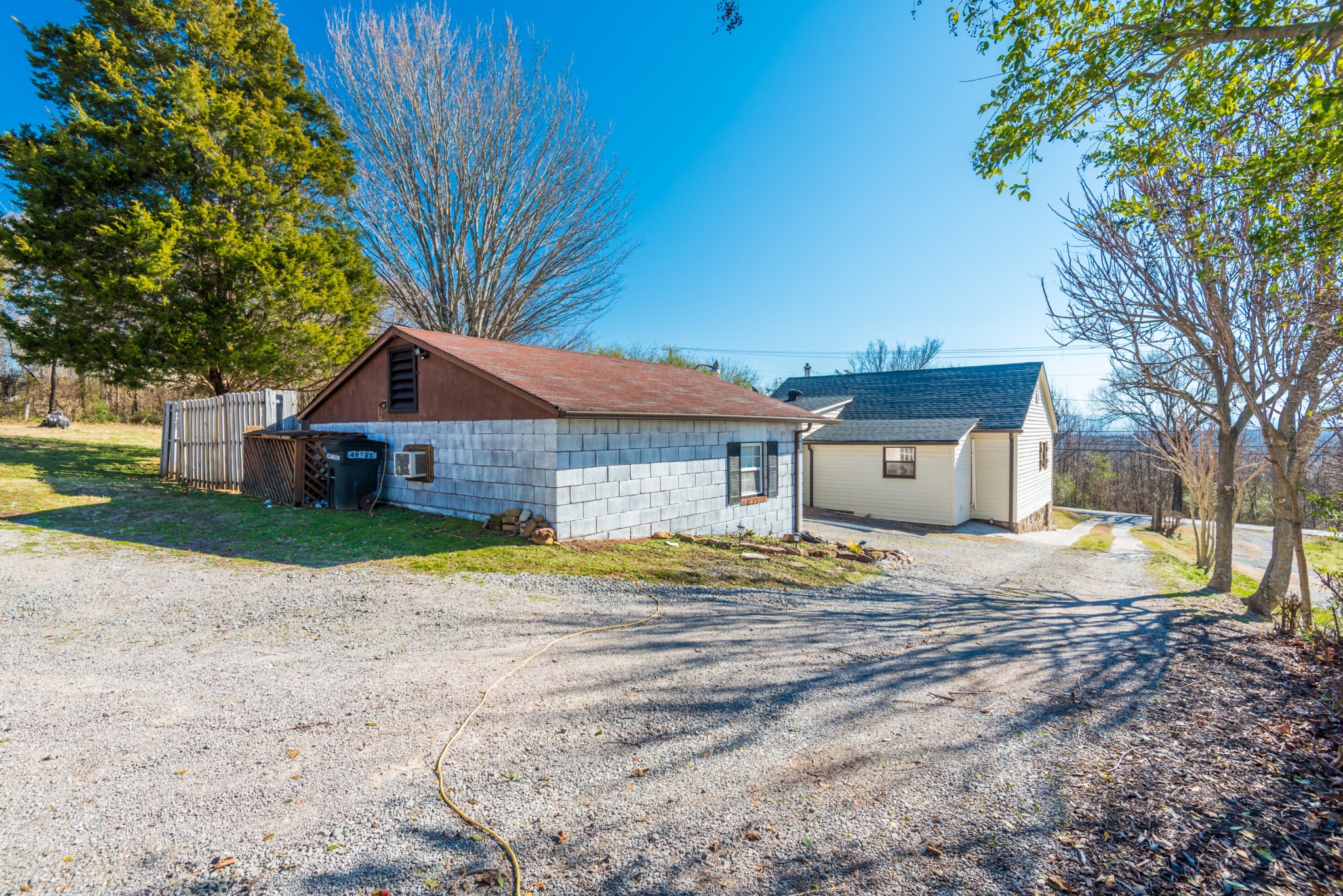6313 Ridgeview Road Knoxville, TN 37918 - Photo 29 of 33 a house that has a tree in front of it
