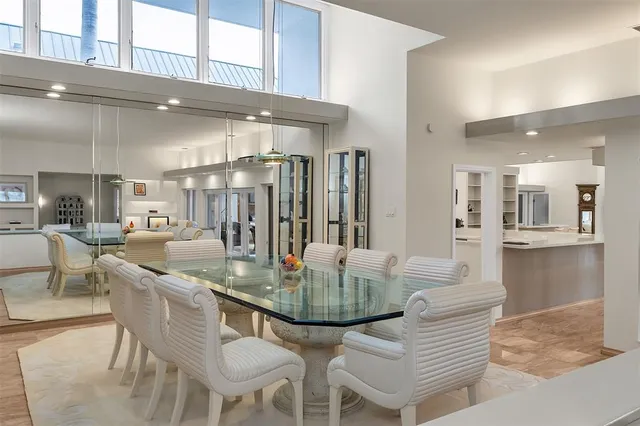a bathroom with a double vanity sink mirror and shower