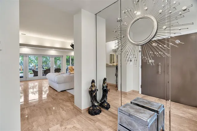 a large spacious bathroom with a tub sink shower and mirror