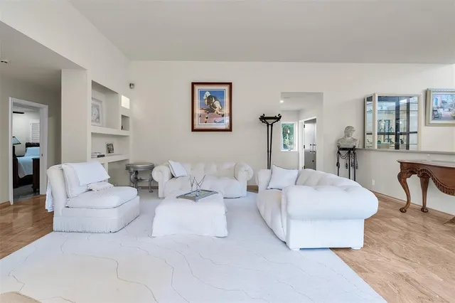 a living room with furniture and a couch