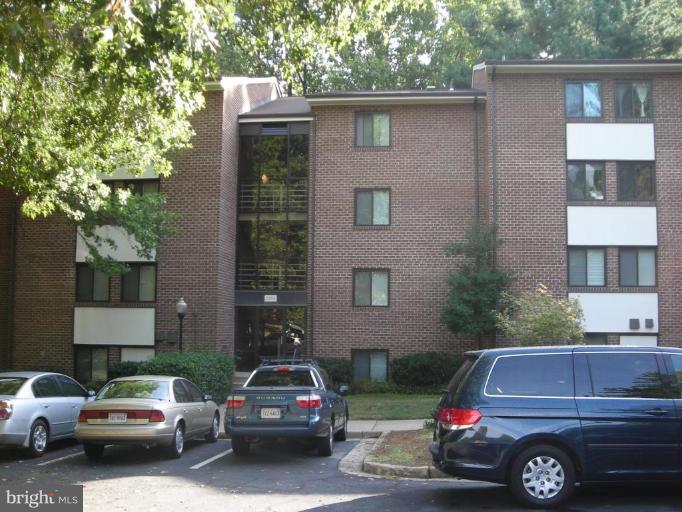 1554 Northgate Square, Unit 54/31B Reston, VA 20190 - Photo 1 of 15 a car parked in front of a house