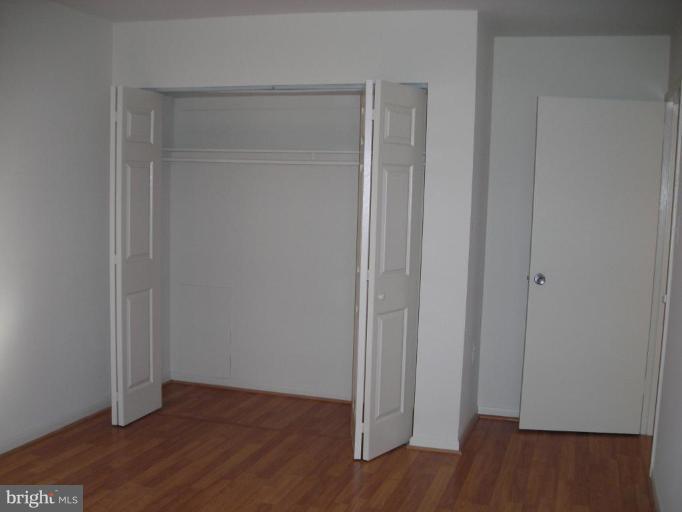 1554 Northgate Square, Unit 54/31B Reston, VA 20190 - Photo 11 of 15 a view of a room with wooden floor