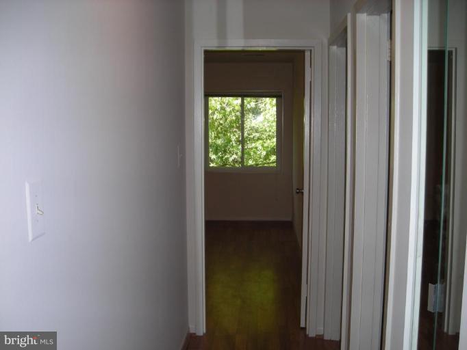 1554 Northgate Square, Unit 54/31B Reston, VA 20190 - Photo 9 of 15 a view of an empty room with a window