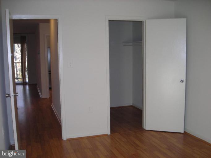 1554 Northgate Square, Unit 54/31B Reston, VA 20190 - Photo 10 of 15 a view of a hallway with wooden floor
