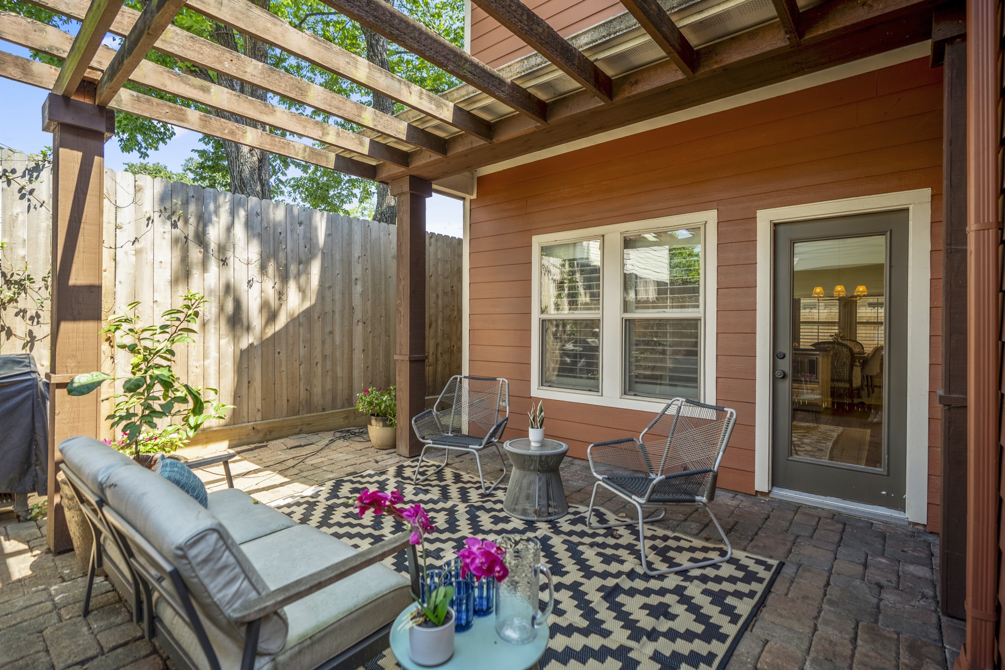 905 West 23rd Street Houston, TX 77008 - Photo 41 of 46 Outdoor entertaining space ideal for dining, relaxing, gardening, or enjoying Houston evenings close to city amenities.