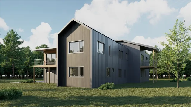 a front view of house with a garden