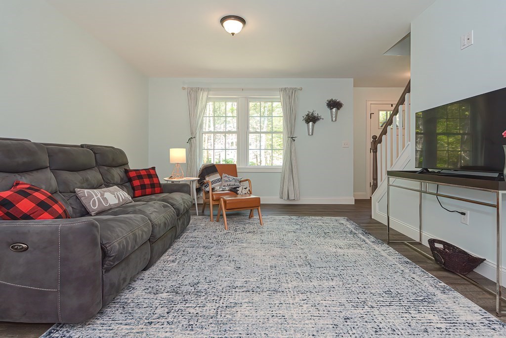 10 Colony Road Phillipston, MA 01331 - Photo 11 of 36 a living room with furniture and a flat screen tv