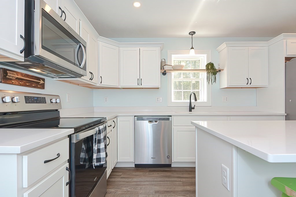 10 Colony Road Phillipston, MA 01331 - Photo 4 of 36 a kitchen with stainless steel appliances granite countertop a sink and a stove