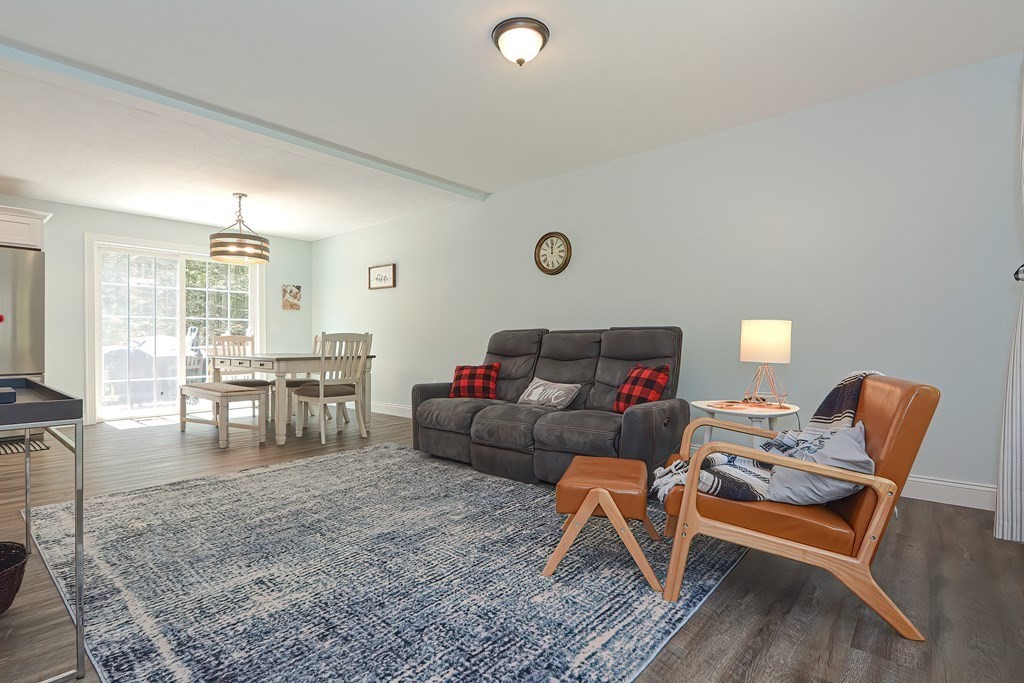 10 Colony Road Phillipston, MA 01331 - Photo 9 of 36 a living room with furniture and wooden floor