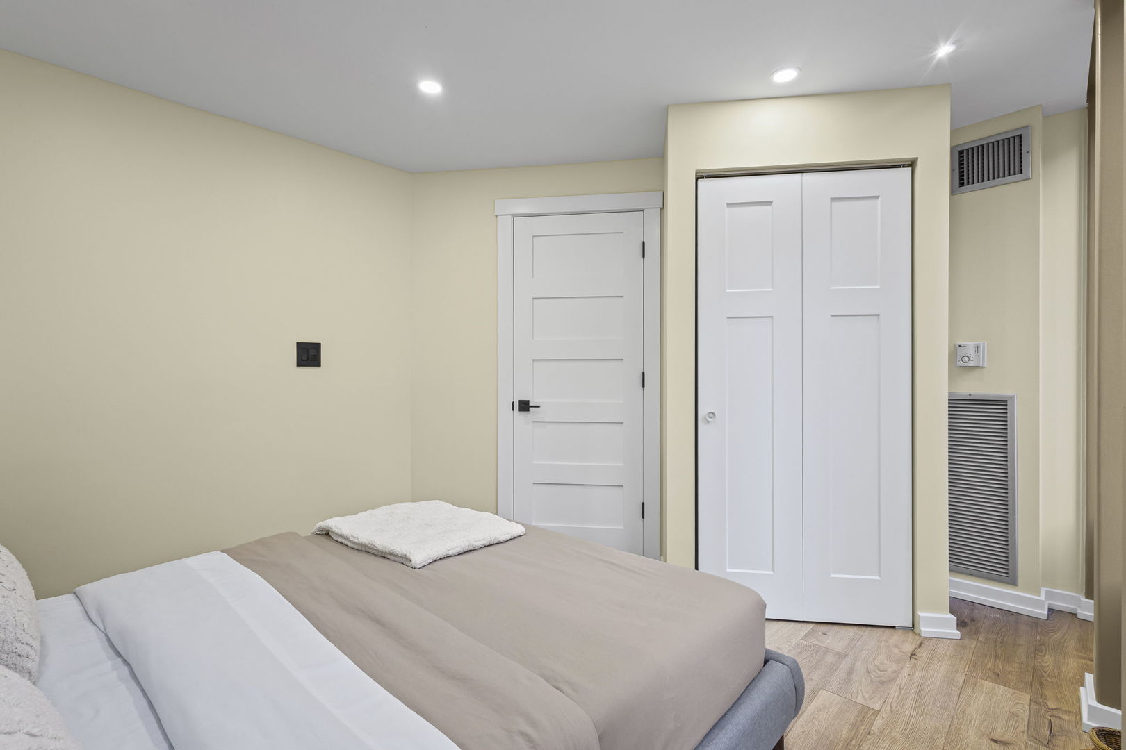 100 East Walton Street, Unit 14D Chicago, IL 60611 - Photo 20 of 36 a bedroom with a bed and hallway