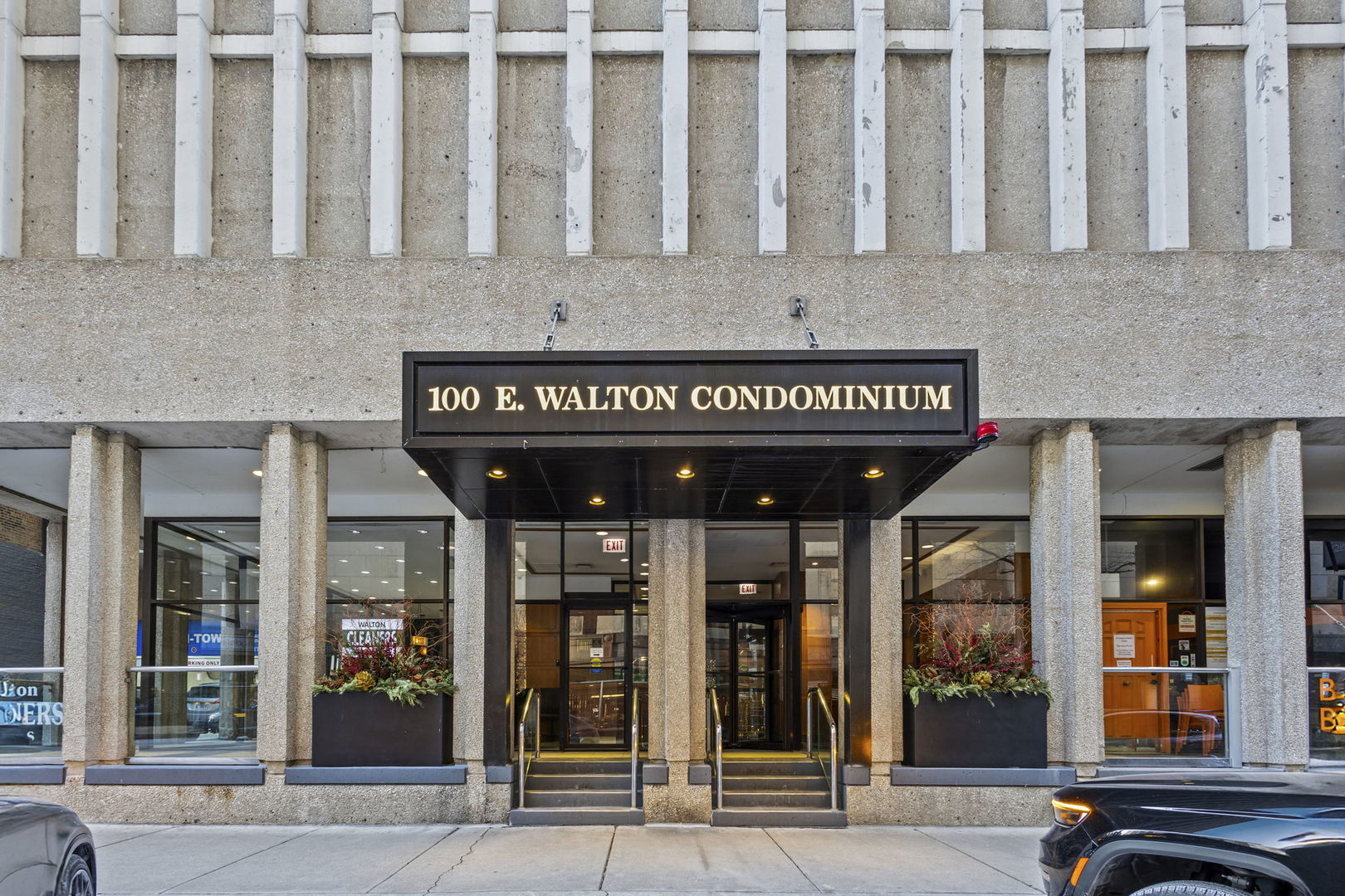 100 East Walton Street, Unit 14D Chicago, IL 60611 - Photo 30 of 36 a view of a building with entrance