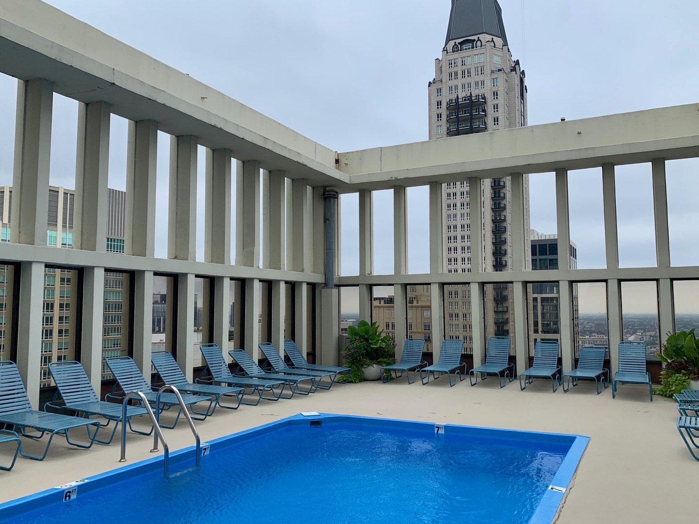 100 East Walton Street, Unit 14D Chicago, IL 60611 - Photo 32 of 36 a view of swimming pool with seating area and furniture