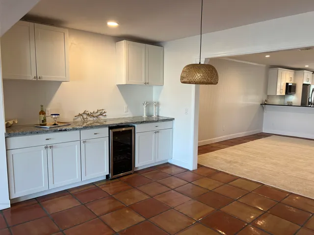 a view of a room with windows