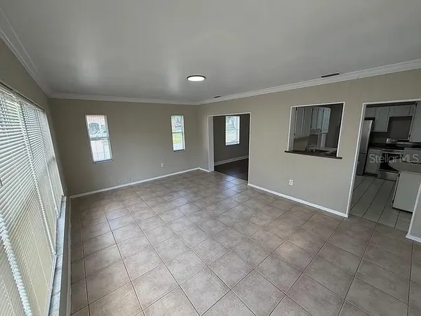 a view of a livingroom with a staircase