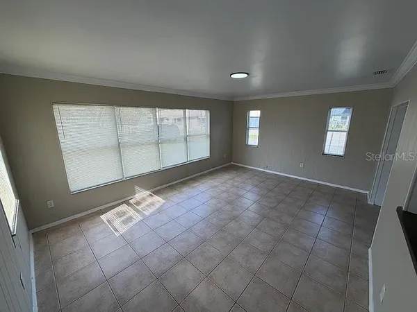 an empty room with windows