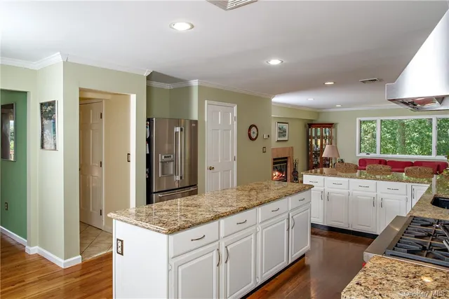 a kitchen with a stove and a sink
