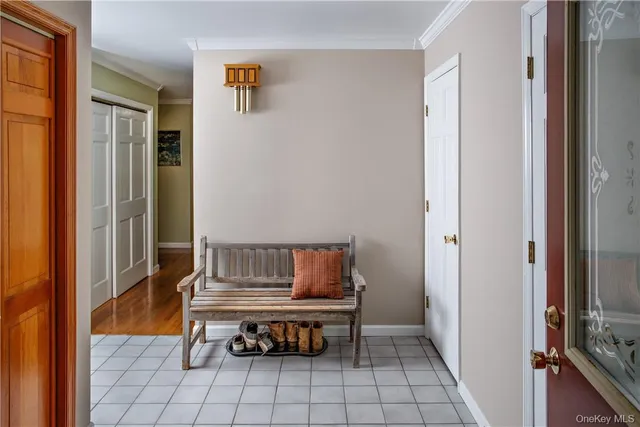 a room with furniture and a window