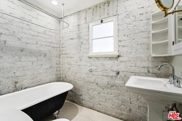 a bathroom with a sink and a bathtub