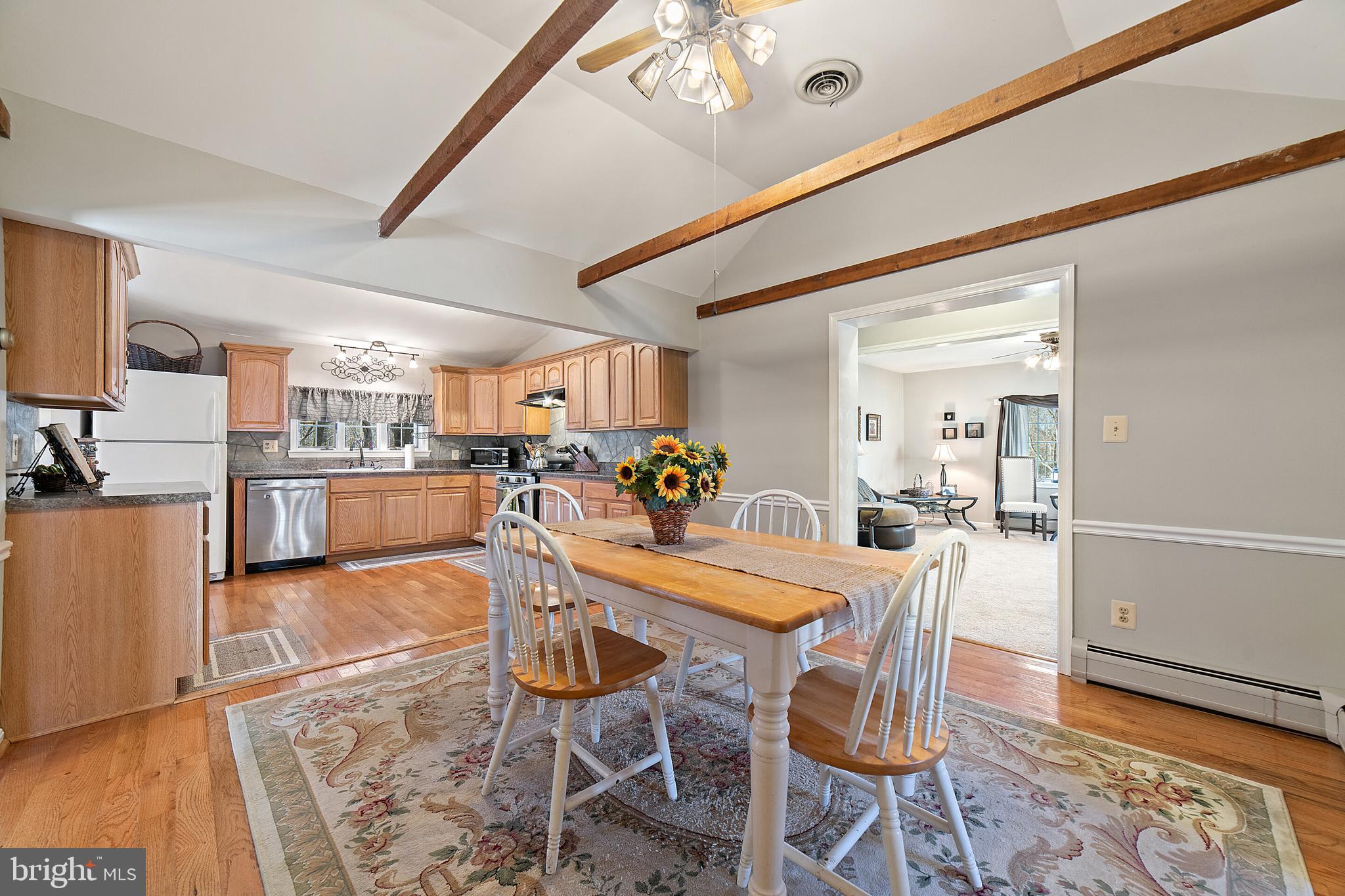 434 Pine Grove Road Bluemont, VA 20135 - Photo 10 of 43 Ample cabinetry & exposed beams in farm kitchen.