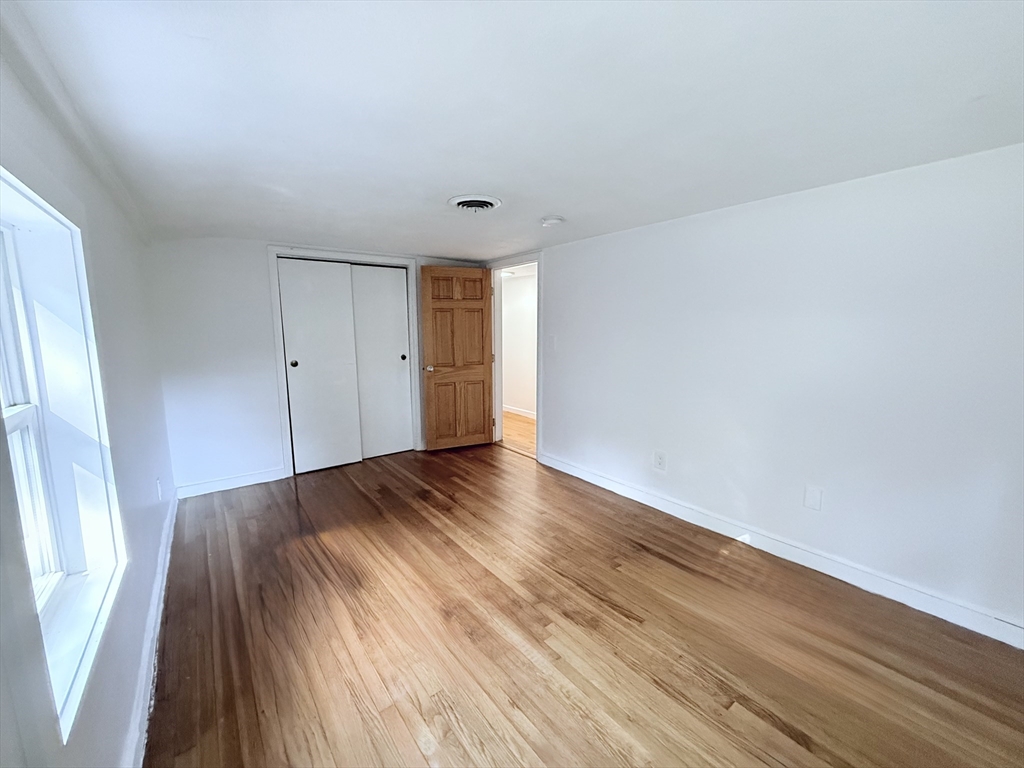 975 South Main Street Bellingham, MA 02019 - Photo 15 of 38 a view of hallway with wooden floor