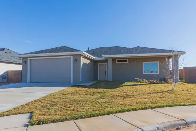 a front view of house with yard