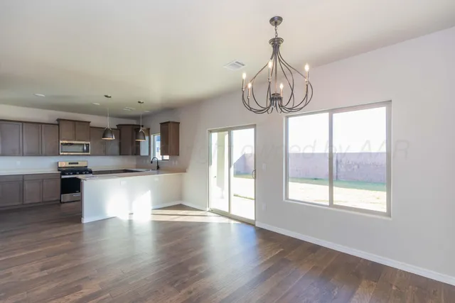 a view of a kitchen and window