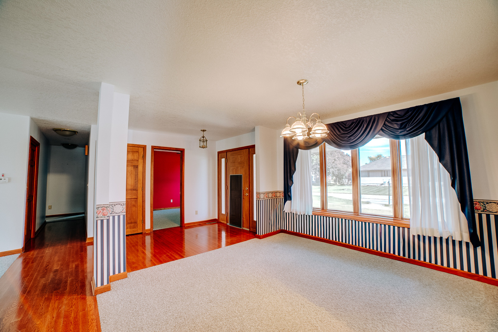 601 Church Street Crescent City, IL 60928 - Photo 17 of 60 a view of empty room with wooden floor and fan
