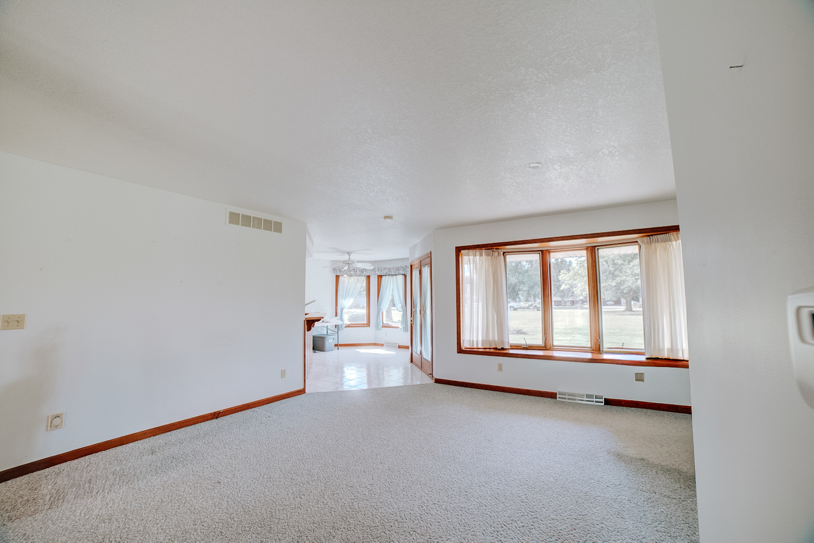 601 Church Street Crescent City, IL 60928 - Photo 27 of 60 wooden floor in an empty room with a window