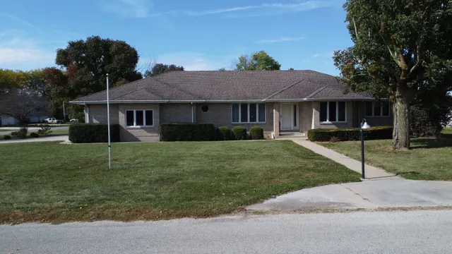 a house view with a garden space