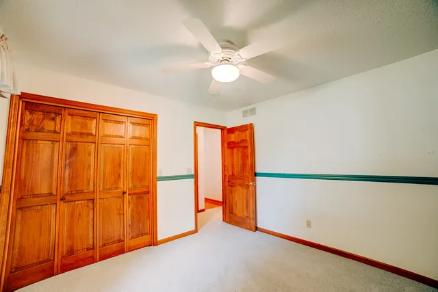 wooden floor and an entryway in a room