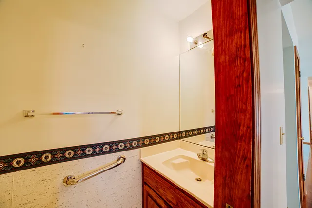 a view of an empty room with stairs