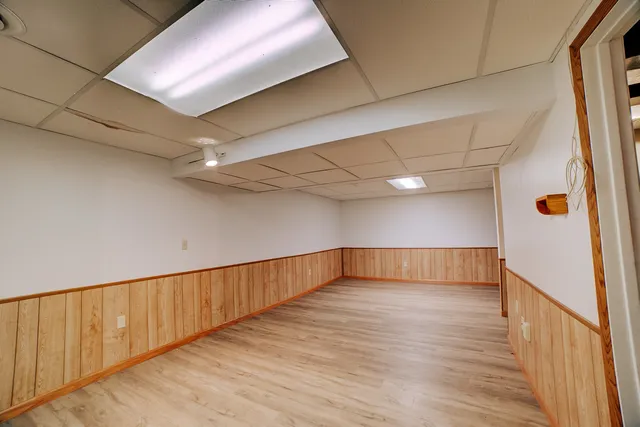 a utility room with electric appliances and cabinets