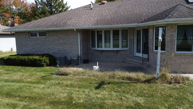 a house with a garden in front of it