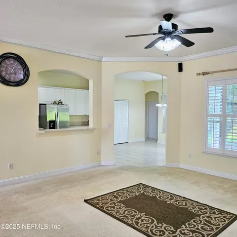 a view of a hallway with a workspace
