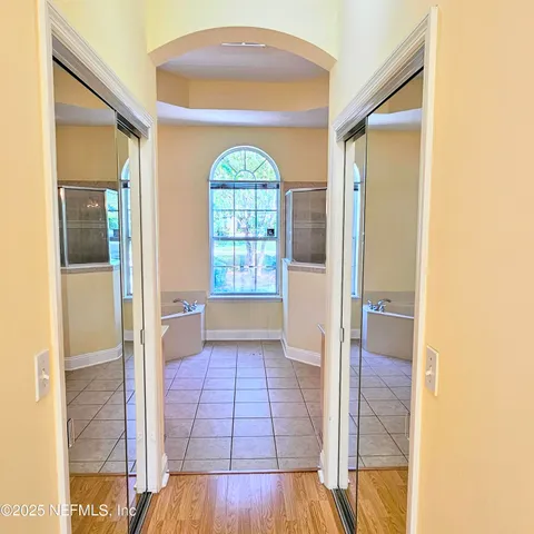 a view of empty room with windows