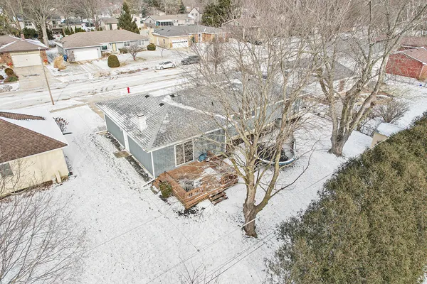 a view of a terrace with snow on the road