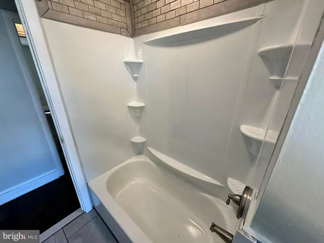 a bathroom with a sink and a tub