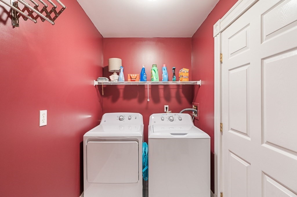 60 Florence Street Lowell, MA 01852 - Photo 22 of 42 a utility room with dryer and washer