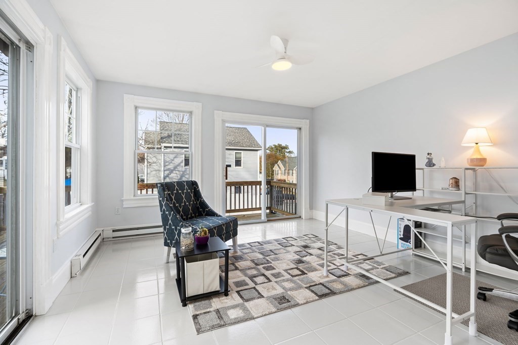 60 Florence Street Lowell, MA 01852 - Photo 23 of 42 a living room with furniture and wooden floor