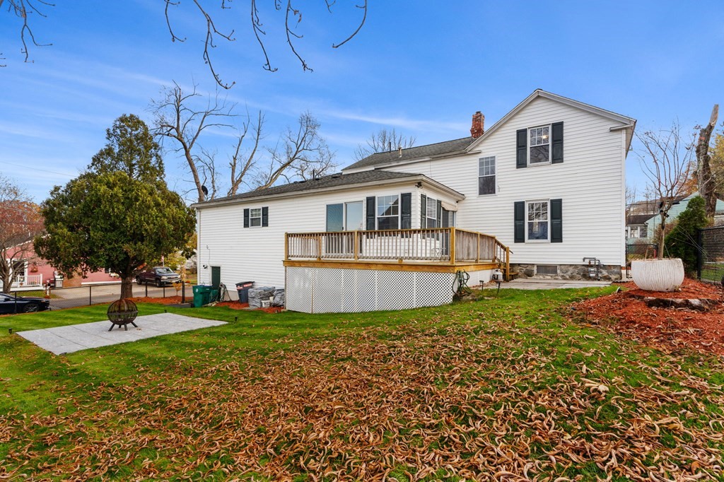 60 Florence Street Lowell, MA 01852 - Photo 34 of 42 a view of a house with a yard