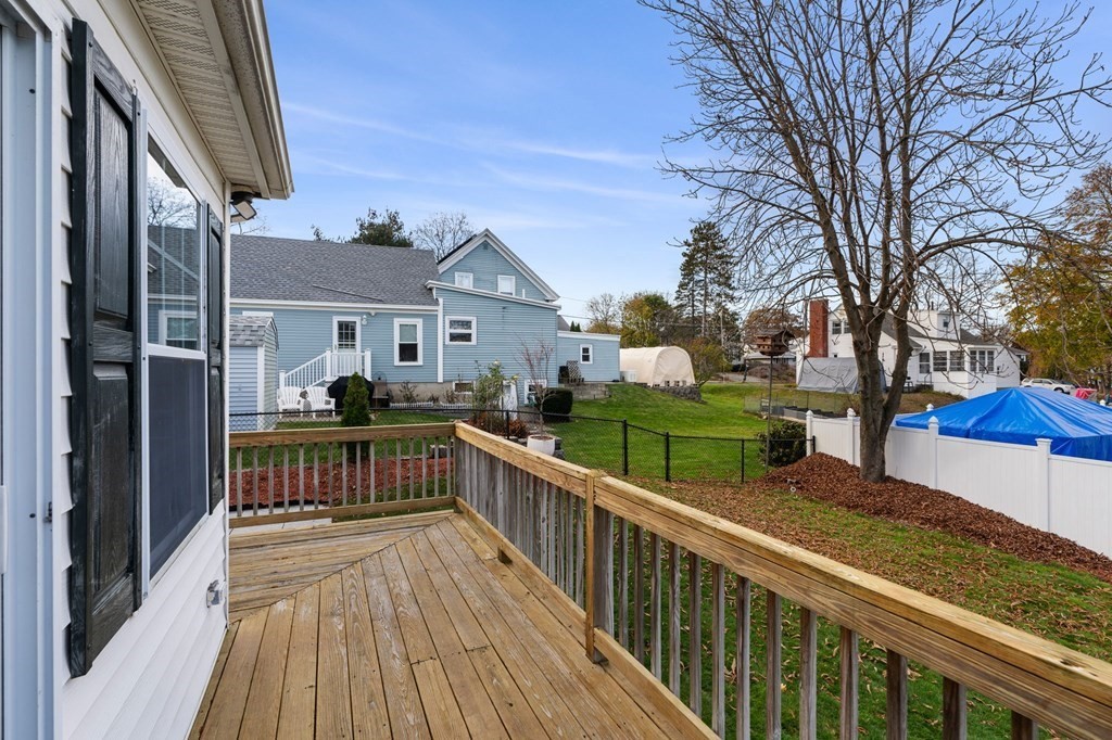 60 Florence Street Lowell, MA 01852 - Photo 36 of 42 a view of a house with wooden deck