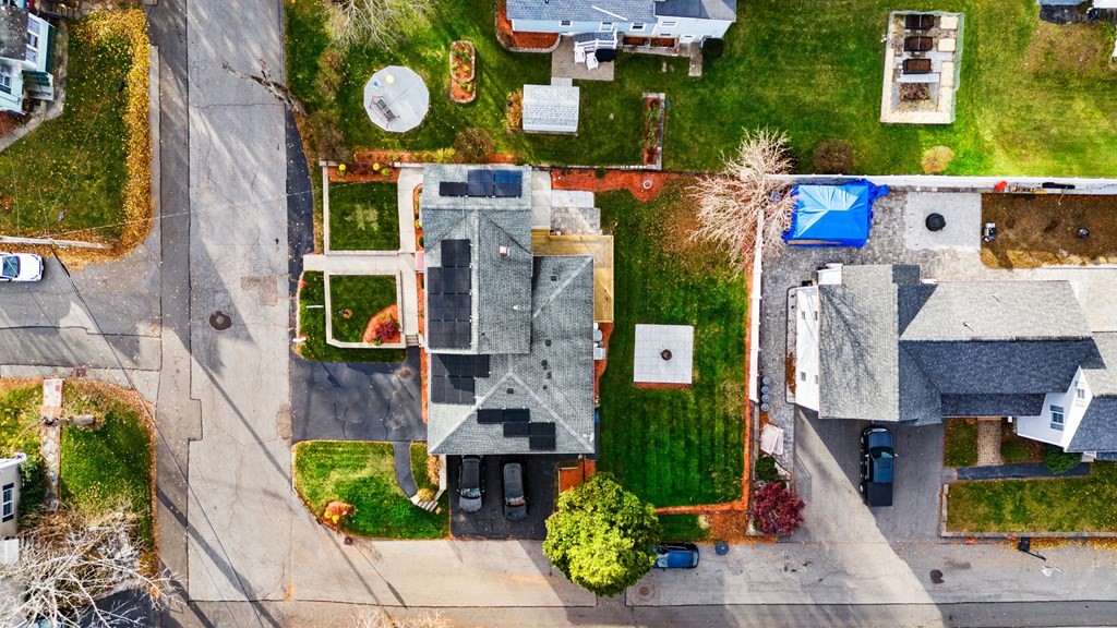 60 Florence Street Lowell, MA 01852 - Photo 37 of 42 an aerial view of residential houses with outdoor space and street view