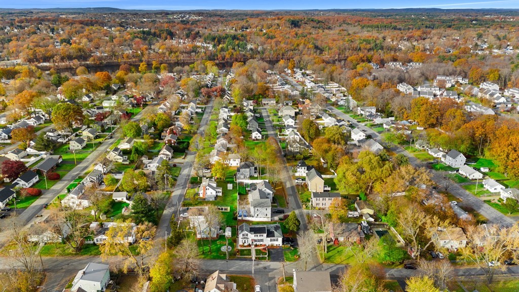 60 Florence Street Lowell, MA 01852 - Photo 40 of 42 an aerial view of residential houses with outdoor space