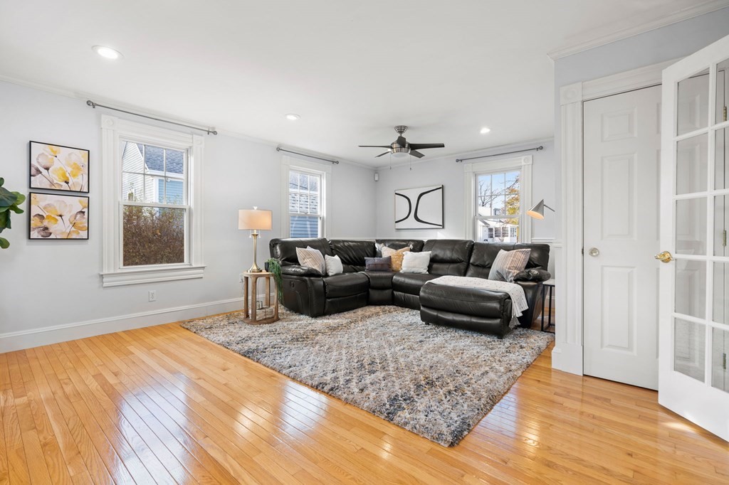 60 Florence Street Lowell, MA 01852 - Photo 4 of 42 a living room with furniture and a couch