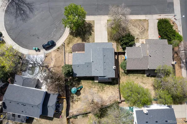 an aerial view of a house with a swimming pool
