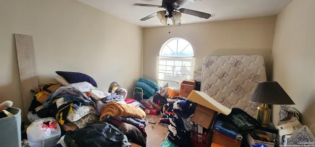 a view of a livingroom with furniture and a chandelier