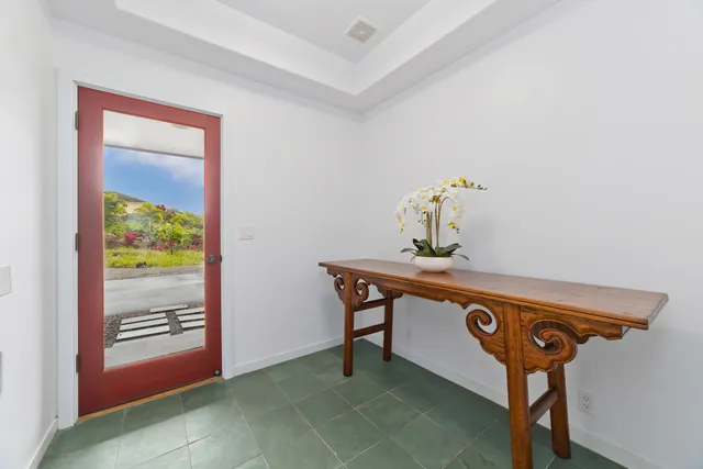 an aerial view of a house with a garden