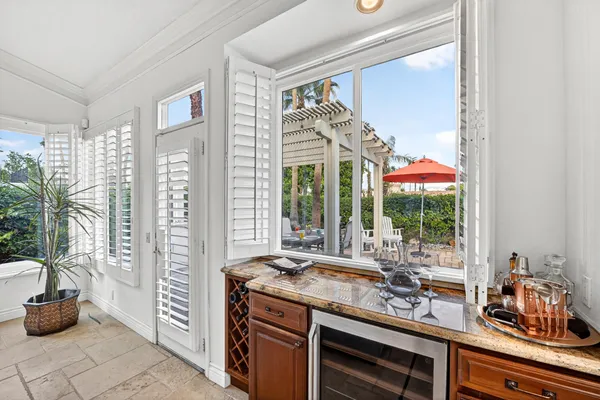 a living room with furniture fireplace and flat screen tv